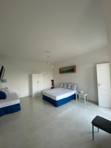 Postel nebo postele na pokoji v ubytování La casa di Sara