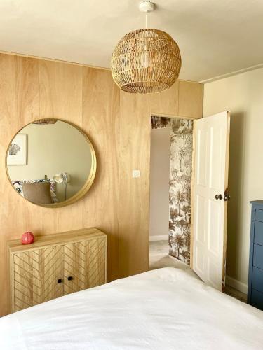 Letto o letti in una camera di North Coast Hideaway