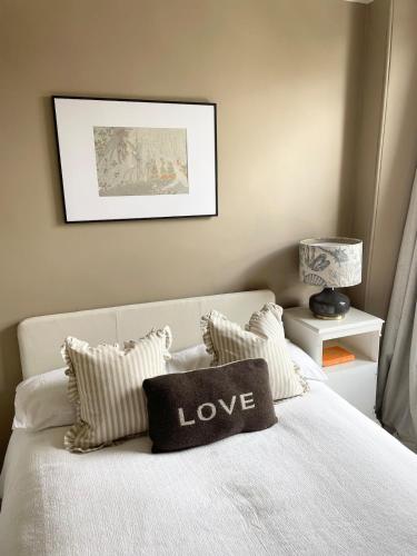 Letto o letti in una camera di North Coast Hideaway