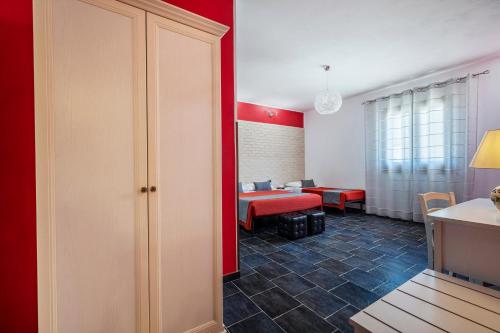 Ένα ή περισσότερα κρεβάτια σε δωμάτιο στο B&B L'Angolino della nonna