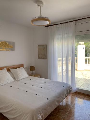 A bed or beds in a room at Casa Ricarda