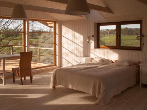 Postel nebo postele na pokoji v ubytování Mokko Lakehouse