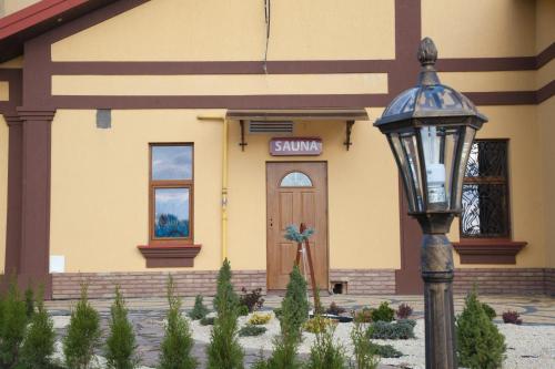 a street light in front of a building at Europe in Solonka