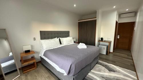 Postel nebo postele na pokoji v ubytování Hotel Lagoluz