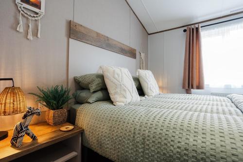 Postel nebo postele na pokoji v ubytování Tequila Sunrise - Ryde