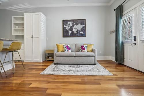 a living room with a couch and a table at 1 bedroom home In Baton Rouge La in Baton Rouge