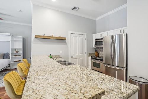 a kitchen with a counter top and a refrigerator at 1 bedroom home In Baton Rouge La in Baton Rouge