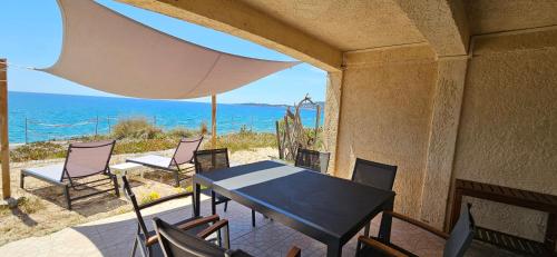 T3 Paradisiaque sur la plage, les pieds dans l'eau