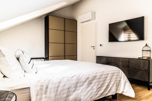 Postel nebo postele na pokoji v ubytování Villa Nest
