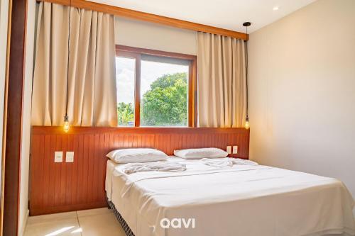 Pousada Recanto Nalu - Quarto à Vistaにあるベッド