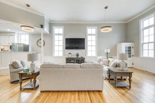 a living room with a couch and a tv at Unique Church Turned Family Retreat Relax and Enjoy in Alliance