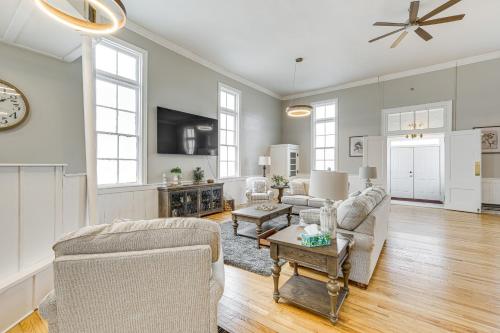 a living room with two couches and a table at Unique Church Turned Family Retreat Relax and Enjoy in Alliance