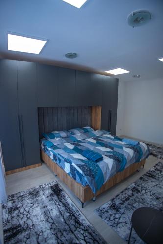 Central Square Apartmentsにあるベッド