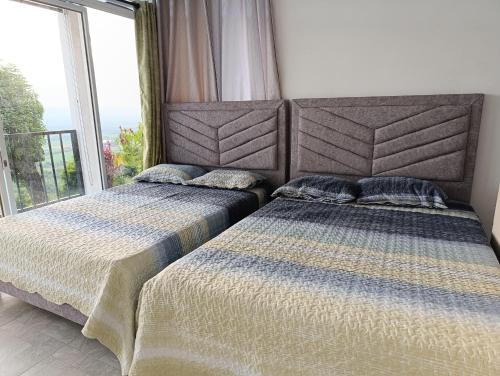 Postel nebo postele na pokoji v ubytování Altamira Luxury