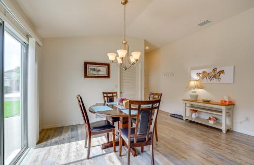 a dining room with a table and chairs at Pet-Friendly Home with Patio in The Villages in Wildwood