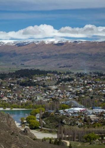 an aerial view of a city and a lake at Almond Court Motel in Alexandra