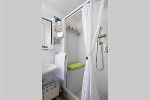 a bathroom with a shower and a sink at Small Luxury Bed & Breakfast in La Spezia