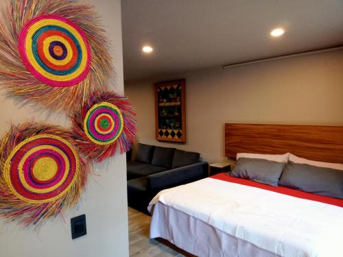 Postel nebo postele na pokoji v ubytování Hotel Casa Nativa Ajijic