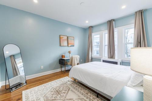 Ένα ή περισσότερα κρεβάτια σε δωμάτιο στο Stylish 3 Bedroom Apartment