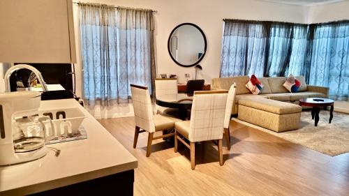 a living room with a couch and a table at Stylish Urban Escape in Downtown Los Angeles in Los Angeles
