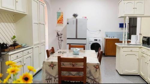 Una cocina o cocineta en 机场附近的民宿roomB