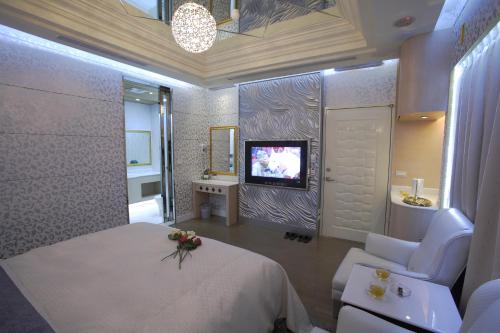 Lai Yin Motelにあるベッド