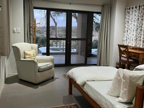 Χώρος καθιστικού στο Imberbe Private Lodge