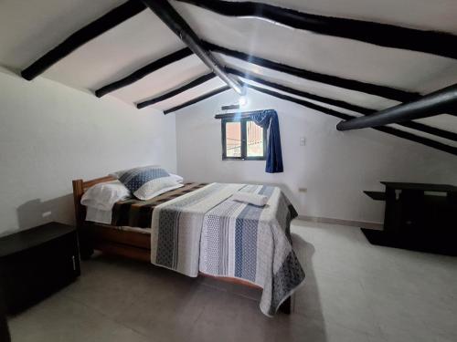 Postel nebo postele na pokoji v ubytování La casa de la montaña