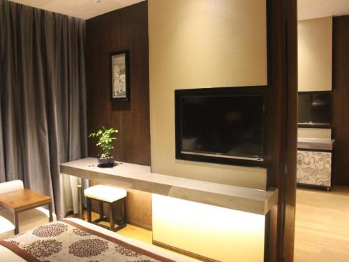 TV o dispositivi per l'intrattenimento presso Southeast Peninsula Hotel Quanzhou