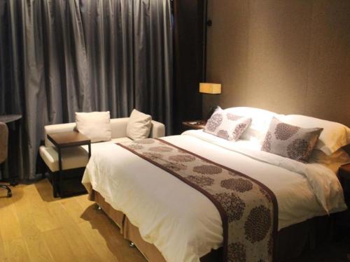 Letto o letti in una camera di Southeast Peninsula Hotel Quanzhou