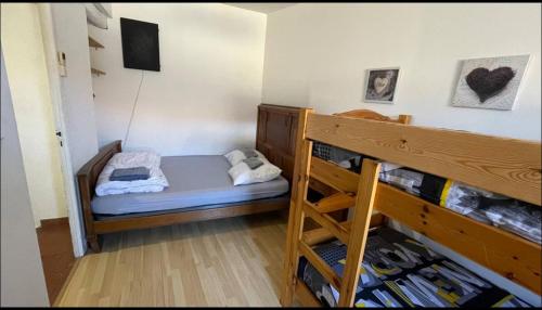 Postel nebo postele na pokoji v ubytování Maison de village atypique