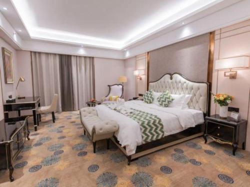 Postel nebo postele na pokoji v ubytování Enping Yucca Hotel