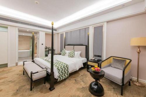 Postel nebo postele na pokoji v ubytování Enping Yucca Hotel