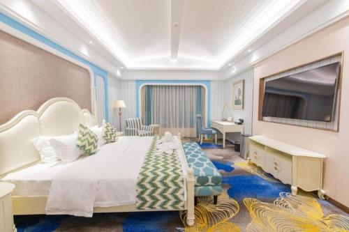 Postel nebo postele na pokoji v ubytování Enping Yucca Hotel