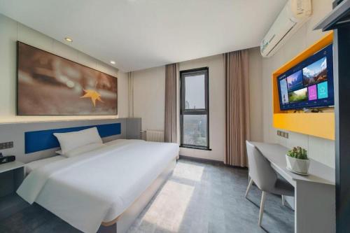 Μια τηλεόραση ή/και κέντρο ψυχαγωγίας στο 7 Days Inn Tai'an Dongpingxi Hualian