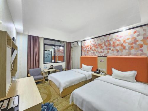 Katil atau katil-katil dalam bilik di PAI Hotel·Huazhou Bus Terminal
