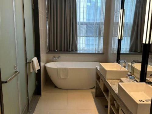Bilik mandi di Echarm Hotel Liuzhou High-speed Railway Station