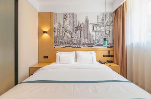 Letto o letti in una camera di City Comfort Inn Jinan West Station Shandong International Convention and Exhibition