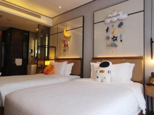 Cama o camas de una habitación en Shenzhen Apex Hotel (Technology Park Branch)