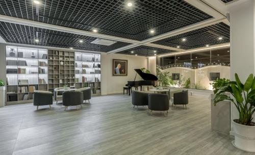 Ruang duduk di 阳朔时间牧歌酒店Yangshuo Time Pastoral Hotel