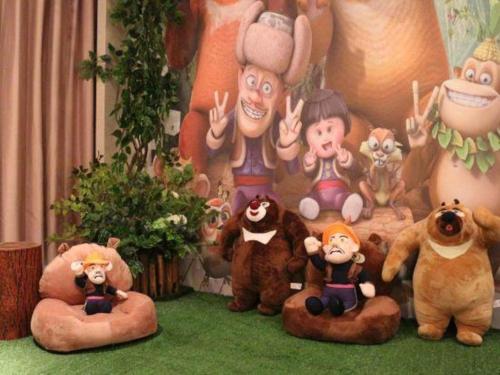 a group of stuffed animals sitting on the grass at Balan International Hotel in Dujiangyan