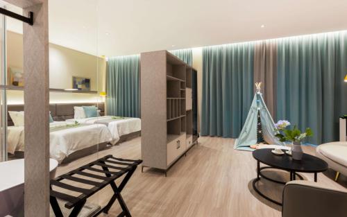 Katil atau katil-katil dalam bilik di 阳朔时间牧歌酒店Yangshuo Time Pastoral Hotel