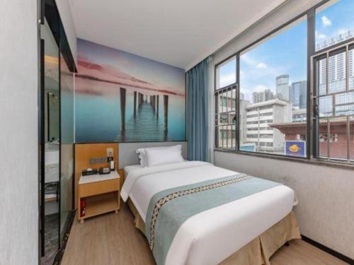 Katil atau katil-katil dalam bilik di Zhenxing Hotel
