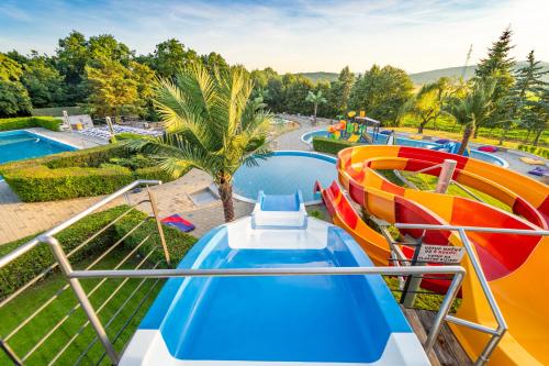 a water slide at a water park at Penzión Aqua Maria in Veľaty