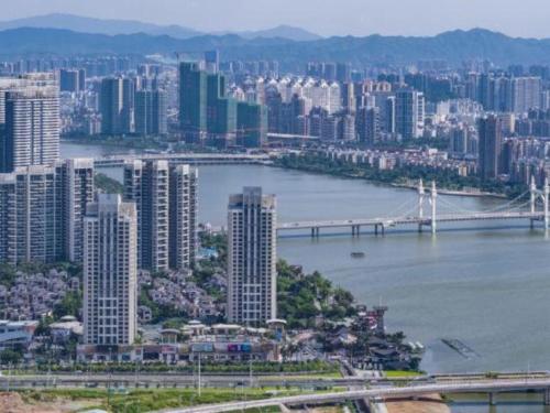 an aerial view of a city with a bridge at Landmark Hotel in Zhuhai