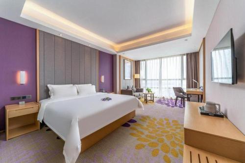 Postel nebo postele na pokoji v ubytování Lavande Hotel·Sihui Dawang