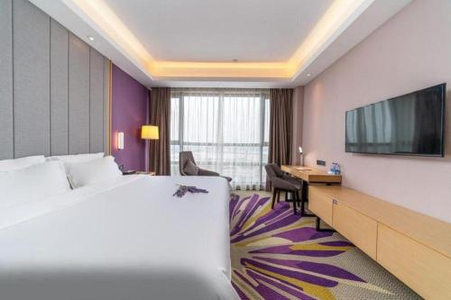 Postel nebo postele na pokoji v ubytování Lavande Hotel·Sihui Dawang