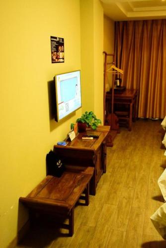 Télévision ou salle de divertissement dans l'établissement Xi'an Huiya Tianmu Hotel