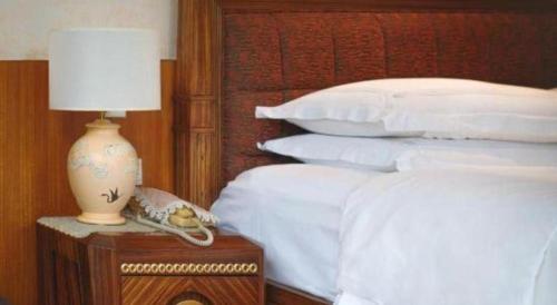Letto o letti in una camera di Hongzhushan Hotel Mount Emei
