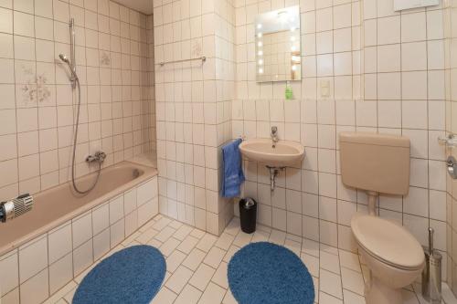 Ένα μπάνιο στο Ferienwohnung Reislöhner